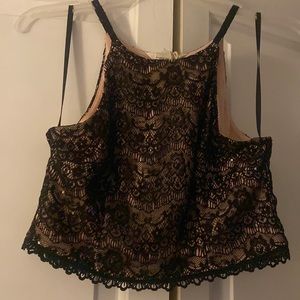 NWT Francesca’s black lace w/ blush underlining crop top. Size Md.